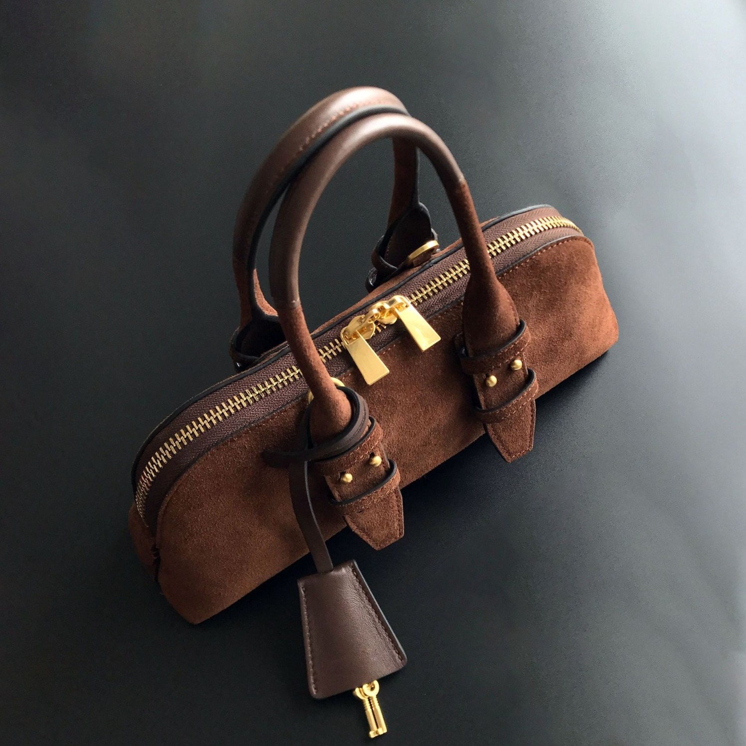 Bolso de bolos de cuero genuin - Top Handle Structured reseña y precio
